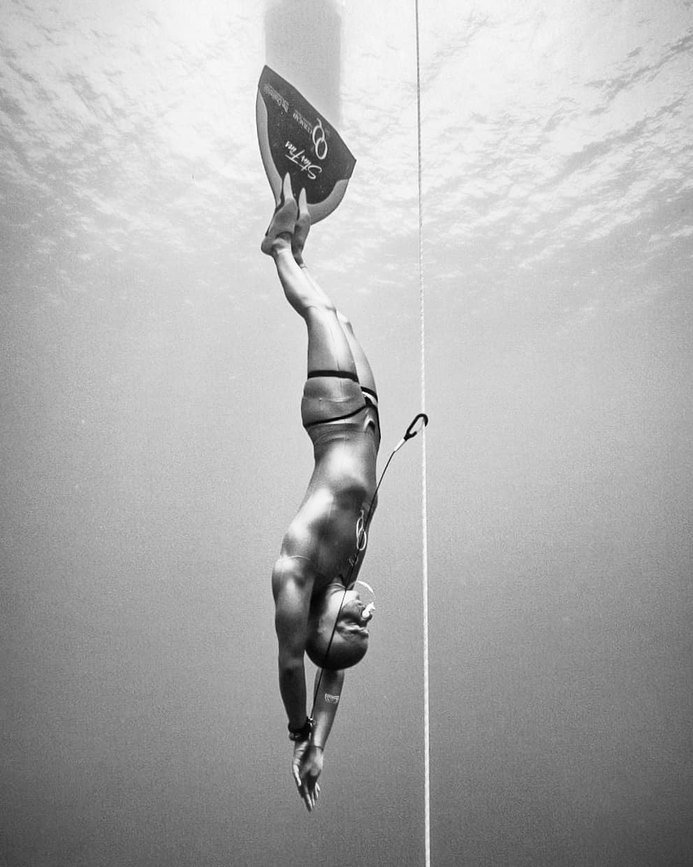 Freediver making a bubble ring